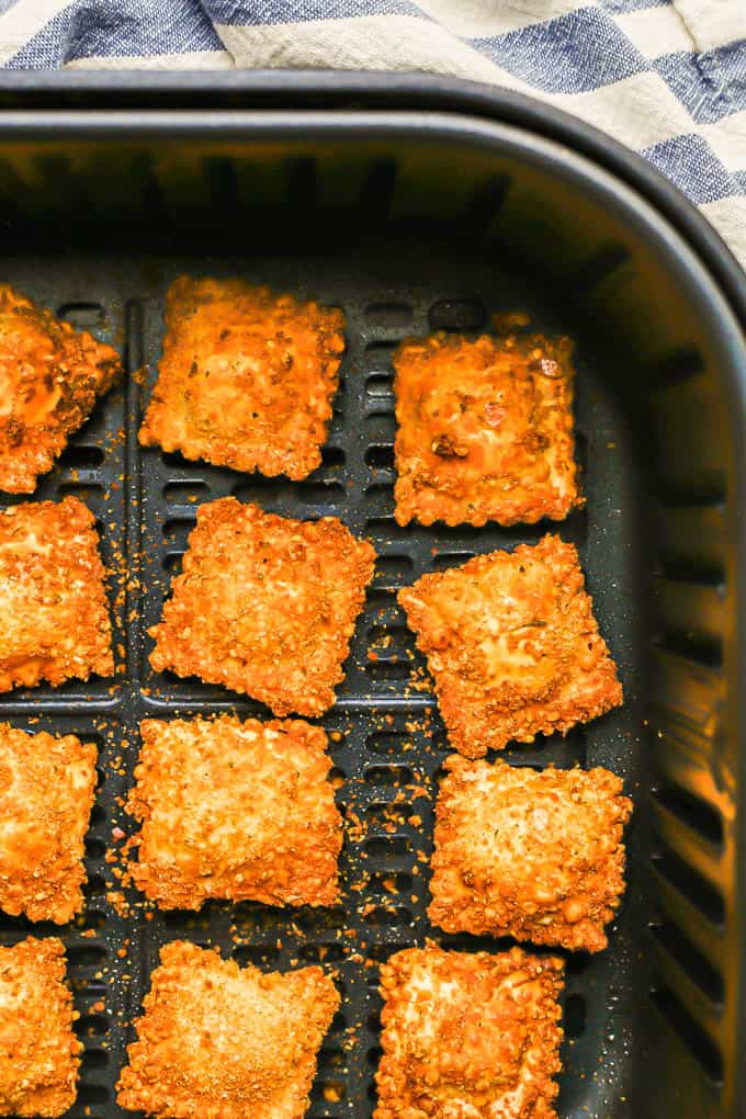 Close up of fried ravioli in an Air Fryer tray