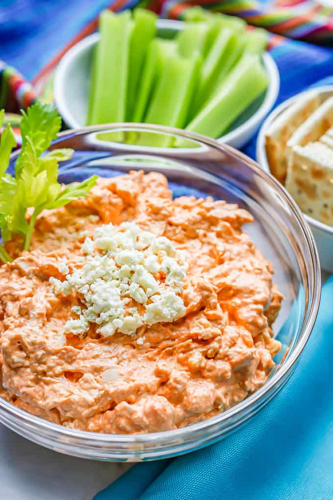 Close up of buffalo chicken dip in a glass bowl