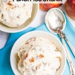 Two white bowls with scoops of homemade peach ice cream with some spoons and fresh peaches to the side and a text overlay on the photo