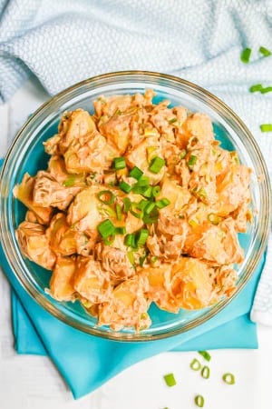 Creamy potato salad in a large glass bowl