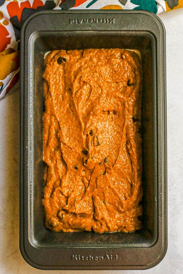 Pumpkin bread batter in a loaf pan before being baked