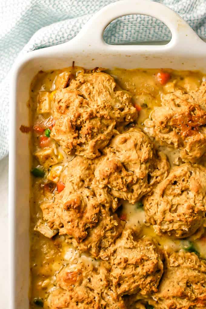 Baked turkey pot pie with drop biscuits on top after coming out of the oven