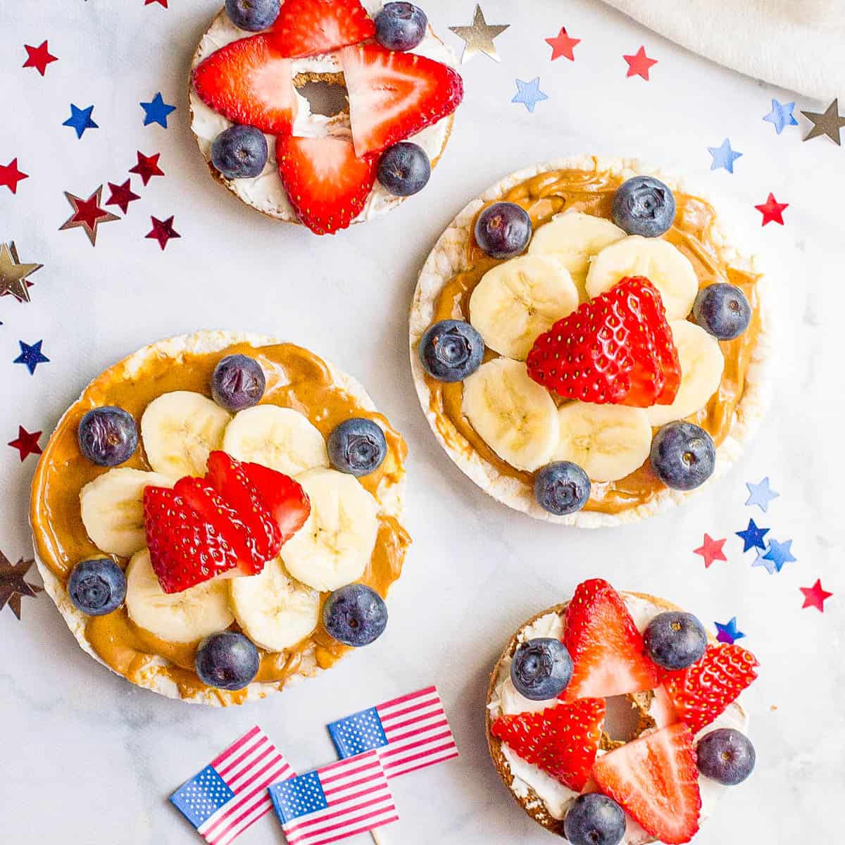 Red white and blue themed breakfasts and snacks with stars and flags nearby for decoration.