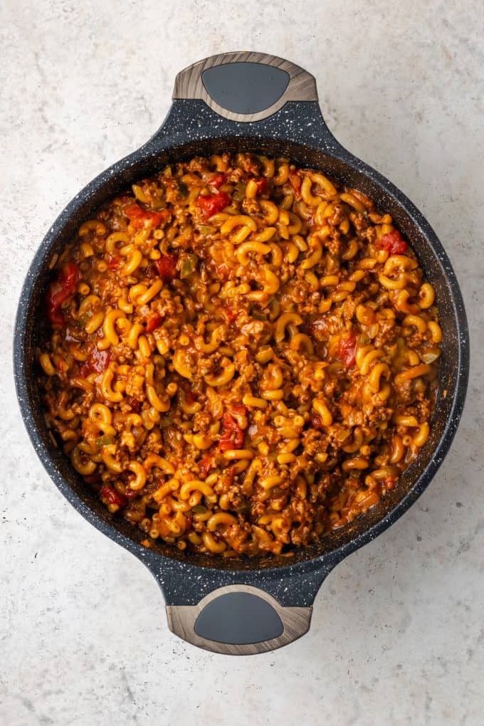 American style goulash with ground beef and elbow macaroni in a cheesy tomato sauce.