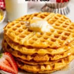 Close up of a stack of cornbread waffles on a plate with a melting pat of butter on top with a text overlay on the photo.
