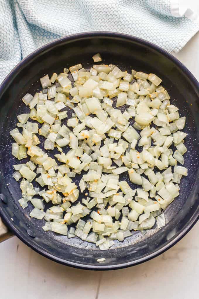 Sautéed onions in a large skillet.