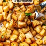 A small spatula scooping up some roasted parsnips from a sheet pan with a text overlay on the photo.