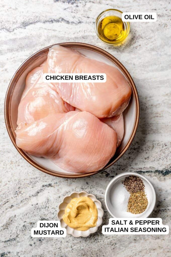 Ingredients laid out in separate containers for making a Dijon chicken recipe.