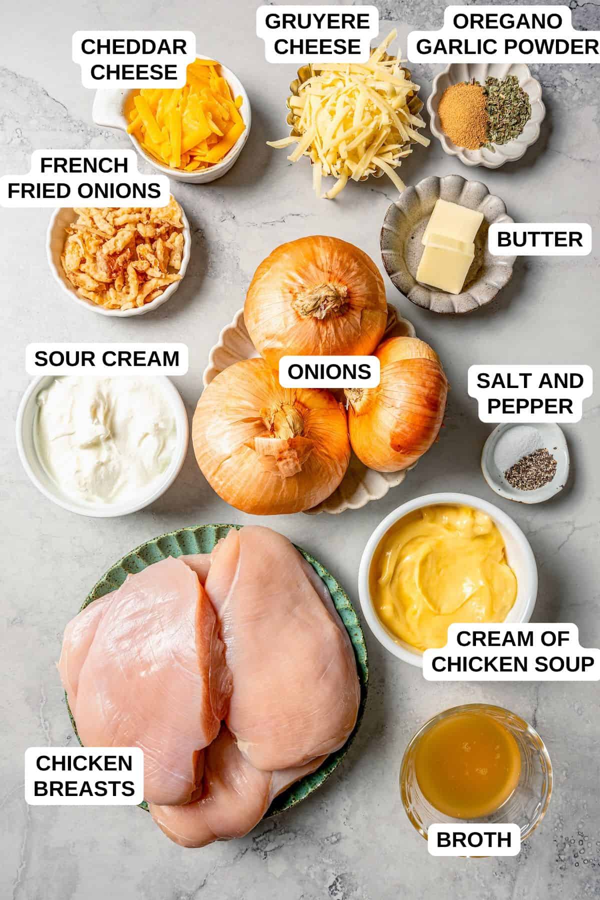 Ingredients laid out in separate bowls for making a chicken recipe with onions, cheese and french fried onions.