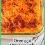 Close up of a cheesy baked grits casserole in a clear dish with a green border and text around the photo.