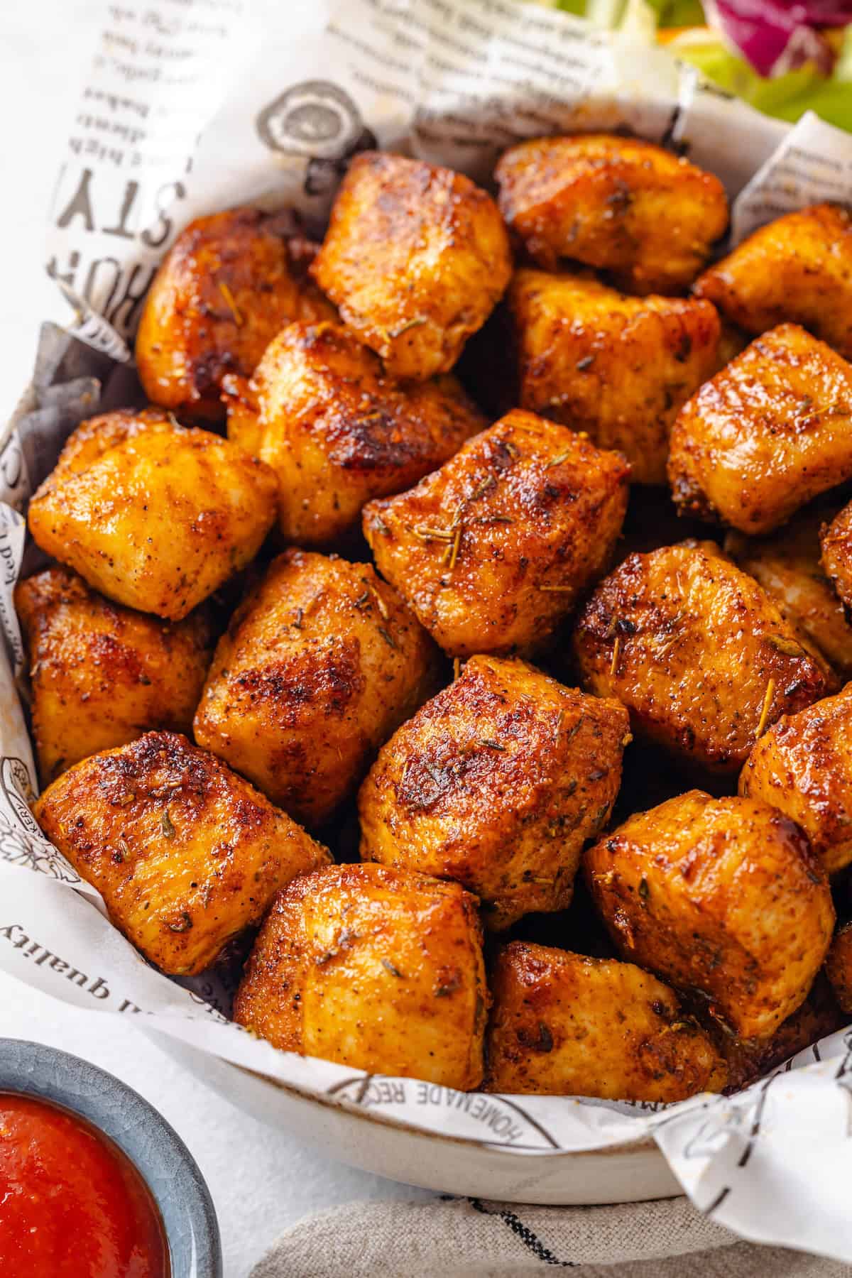 Close up of chicken bites in a bowl.