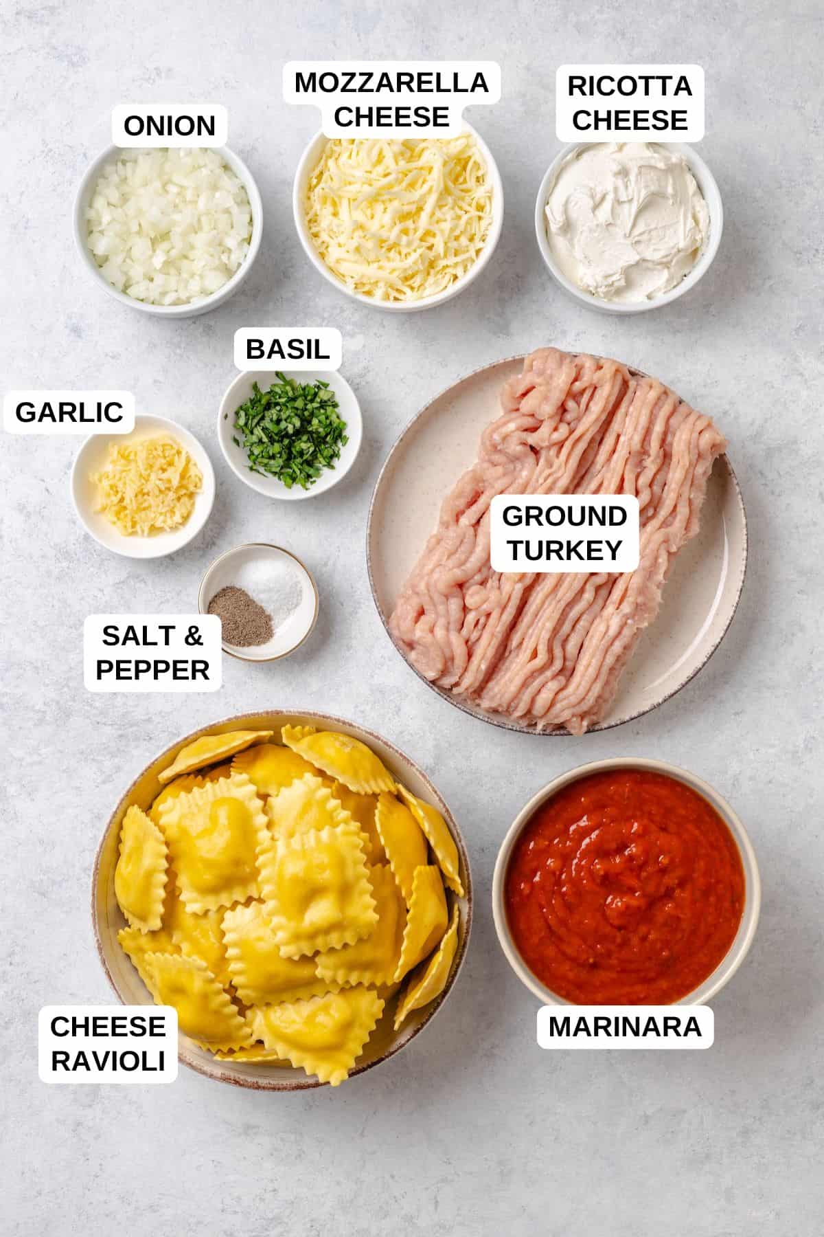 Ingredients laid out in separate containers for making ravioli lasagna with ground turkey.