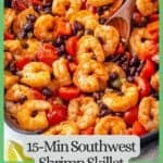 A wooden spoon resting in a large skillet with a mixture of shrimp, black beans, tomatoes and peppers with a green border and text around the photo.