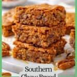 A stack of three square pieces of Southern chew bread on a marble slab with pecans scattered around and a green border and text around the photo.