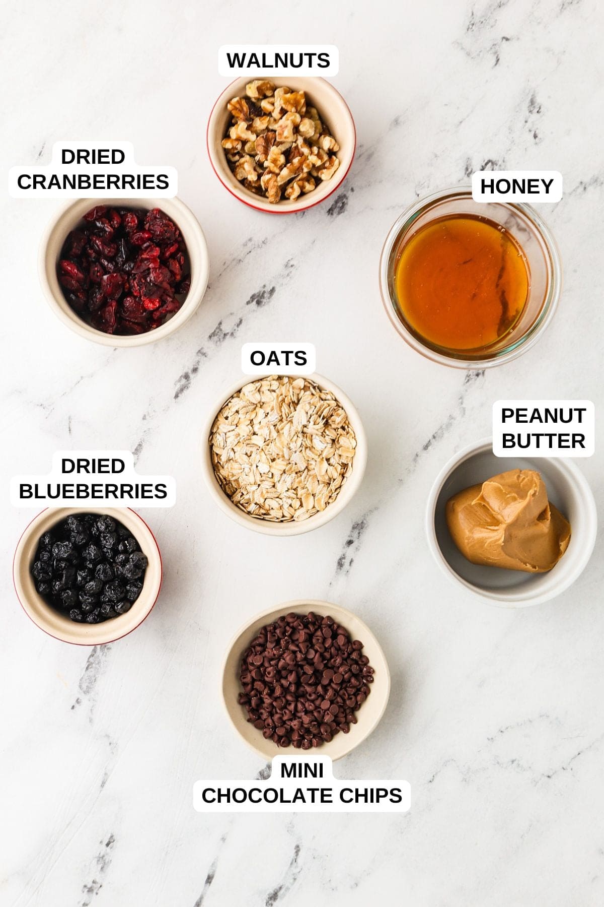 Ingredients laid out in separate bowls for making homemade healthy granola bites.
