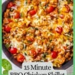A BBQ chicken skillet with spinach and tomatoes and melted cheese on top with some lime wedges to the side and a green border and text around the photo.